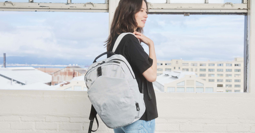 Woman with Aer Go 2 backpack