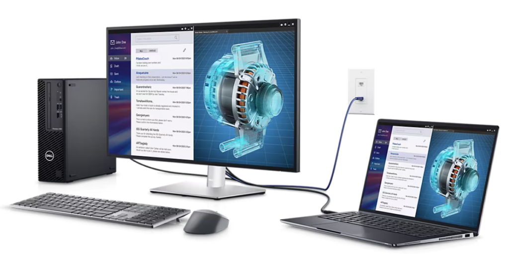 Image of monitor connected to two computers, mouse and keyboard