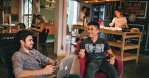 Young people working in coffee shop