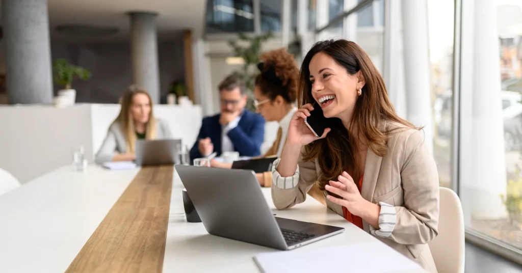 Remote worker reviewing documents at home office desk