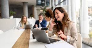 Remote worker reviewing documents at home office desk