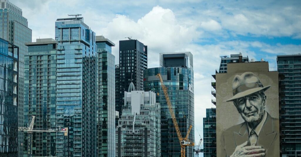 Montreal skyline featuring the Leonard Cohen mural